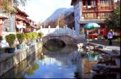 https://media-cdn.tripadvisor.com/media/photo-s/01/14/b9/b9/lijiang-bridge-square.jpg