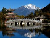https://www.chinadiscovery.com/assets/images/yunnan/lijiang/lijiang-ancient-town-full.jpg